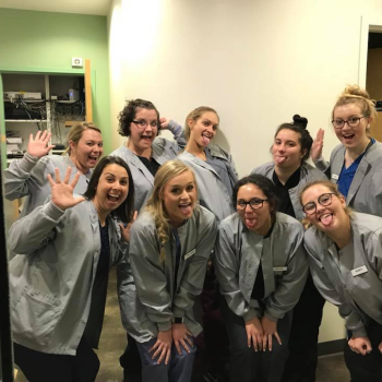 Dental assisting students making funny faces